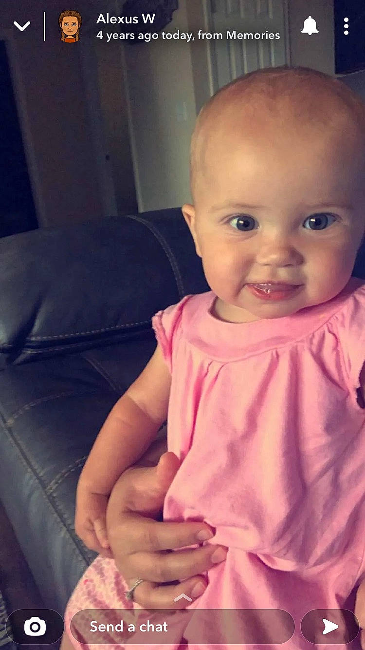 Alexandria is registered to the contest to win money with this photo: baby, baby_toddler_clothing, cheek, chin, eye, eyebrow, facial_expression, finger, gesture, happy, head, iris, lip, mouth, neck, nose, person, pink, skin, sleeve