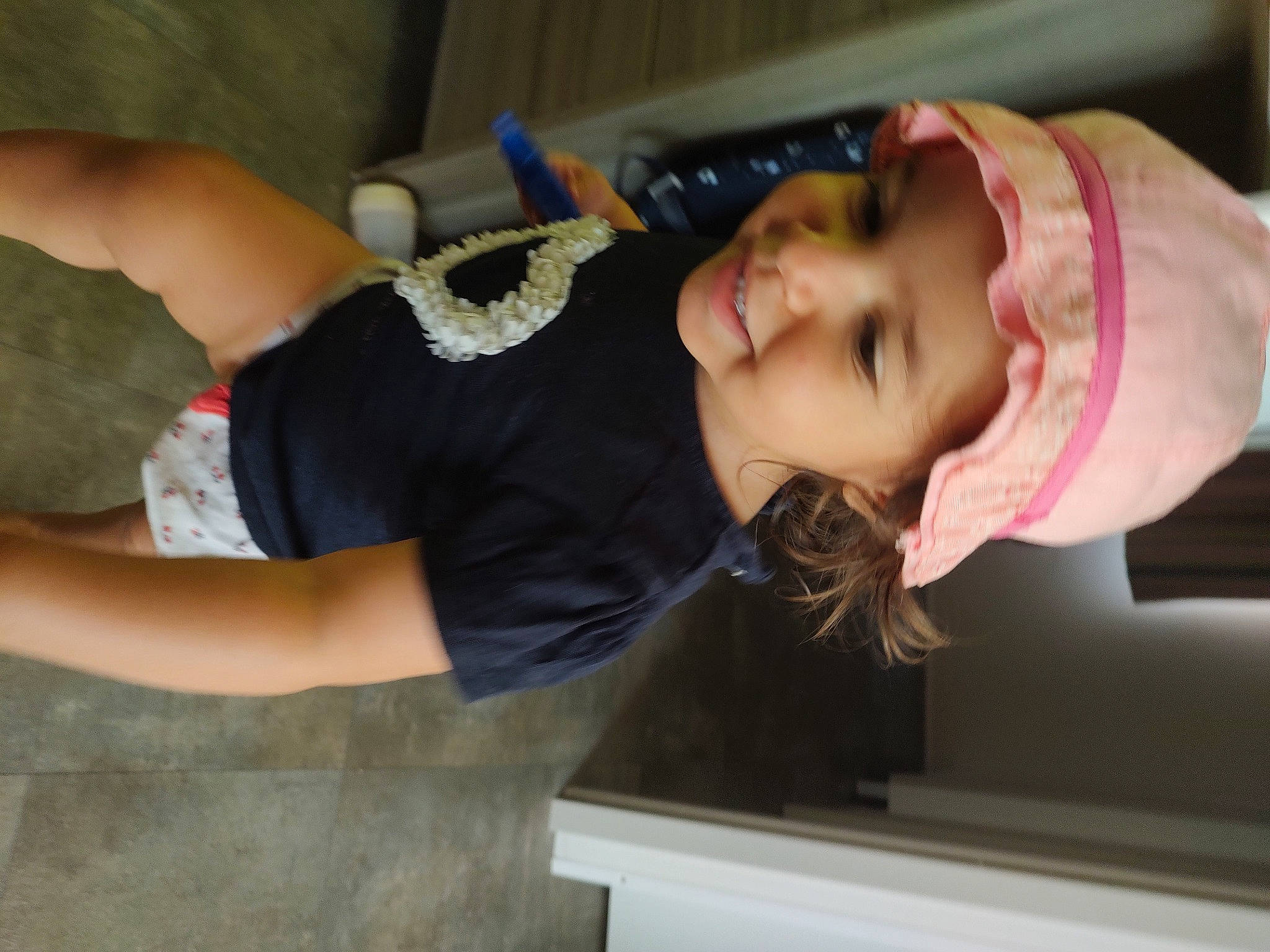 Kaina participe au concours pour gagner de l'argent avec cette photo : child, elbow, fun, gesture, headwear, joy, mouth, person, room, smile, toddler, window, wrist