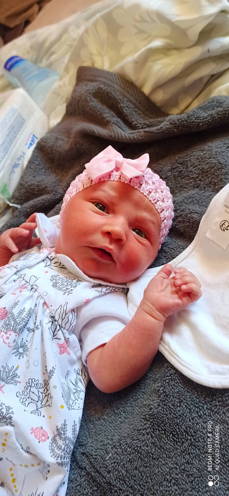 Mya participe au concours pour gagner de l'argent avec cette photo : baby, baby_sleeping, baby_toddler_clothing, cheek, child, chin, comfort, eyelash, face, gesture, happy, head, headwear, linens, lip, nose, person, pink, skin, sleeve