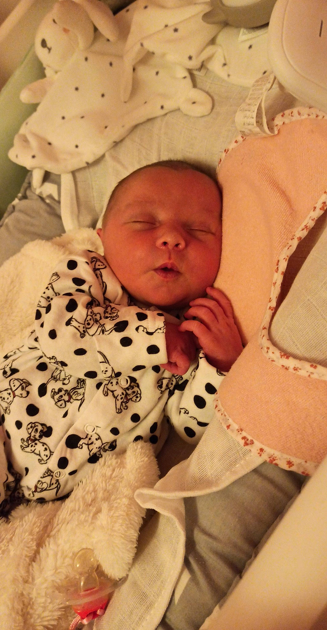 Mya participe au concours pour gagner de l'argent avec cette photo : baby, baby_products, baby_sleeping, baby_toddler_clothing, bed, bedding, bedtime, cheek, child, comfort, linens, mouth, nose, pattern, person, pink, room, skin, textile, thumb