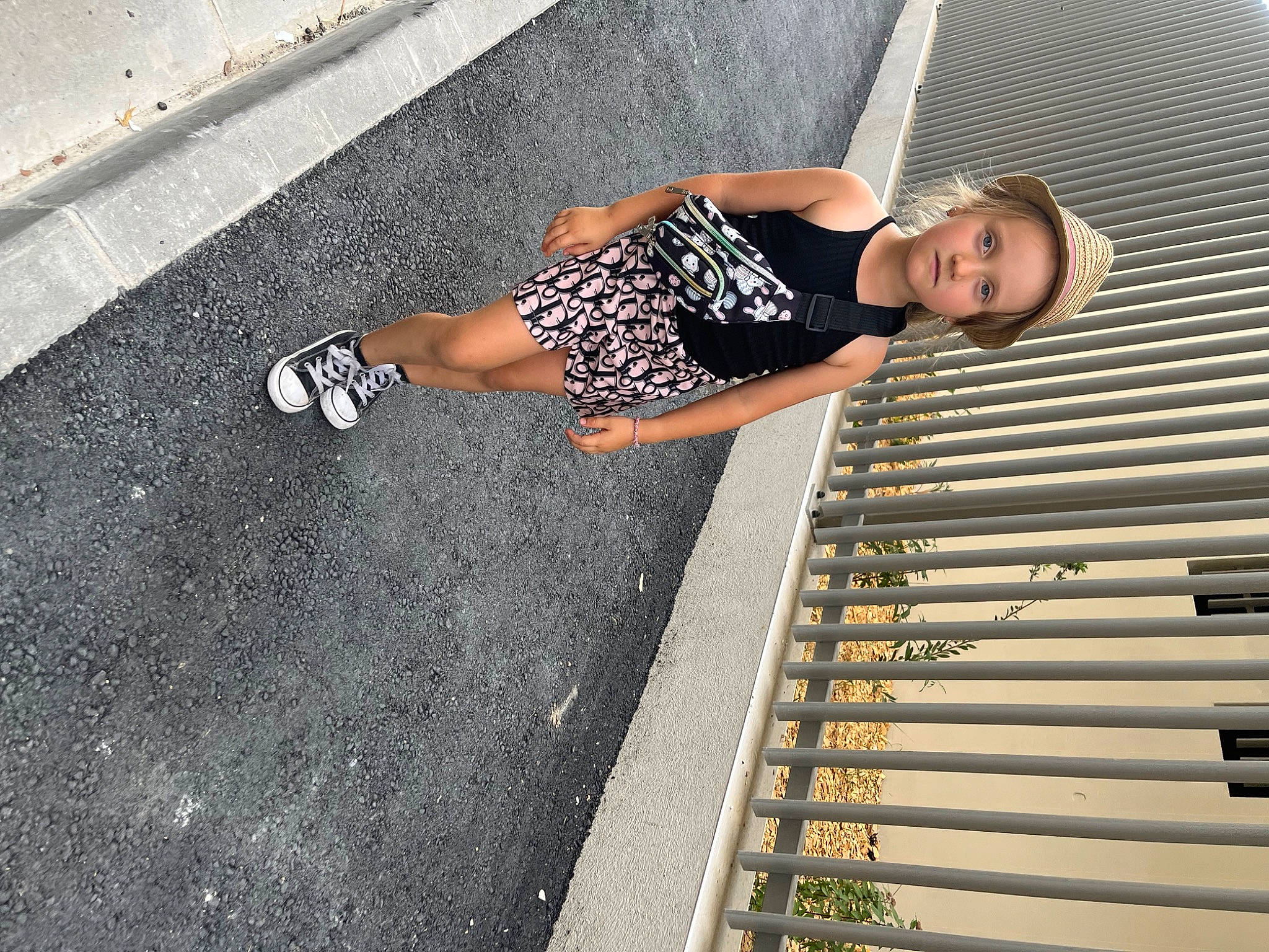 Nélia participe au concours pour gagner de l'argent avec cette photo : asphalt, calf, concrete, dress, fun, human_leg, knee, leg, leisure, pattern, person, road_surface, sandal, shadow, sidewalk, sitting, stairs, street_fashion, thigh, waist