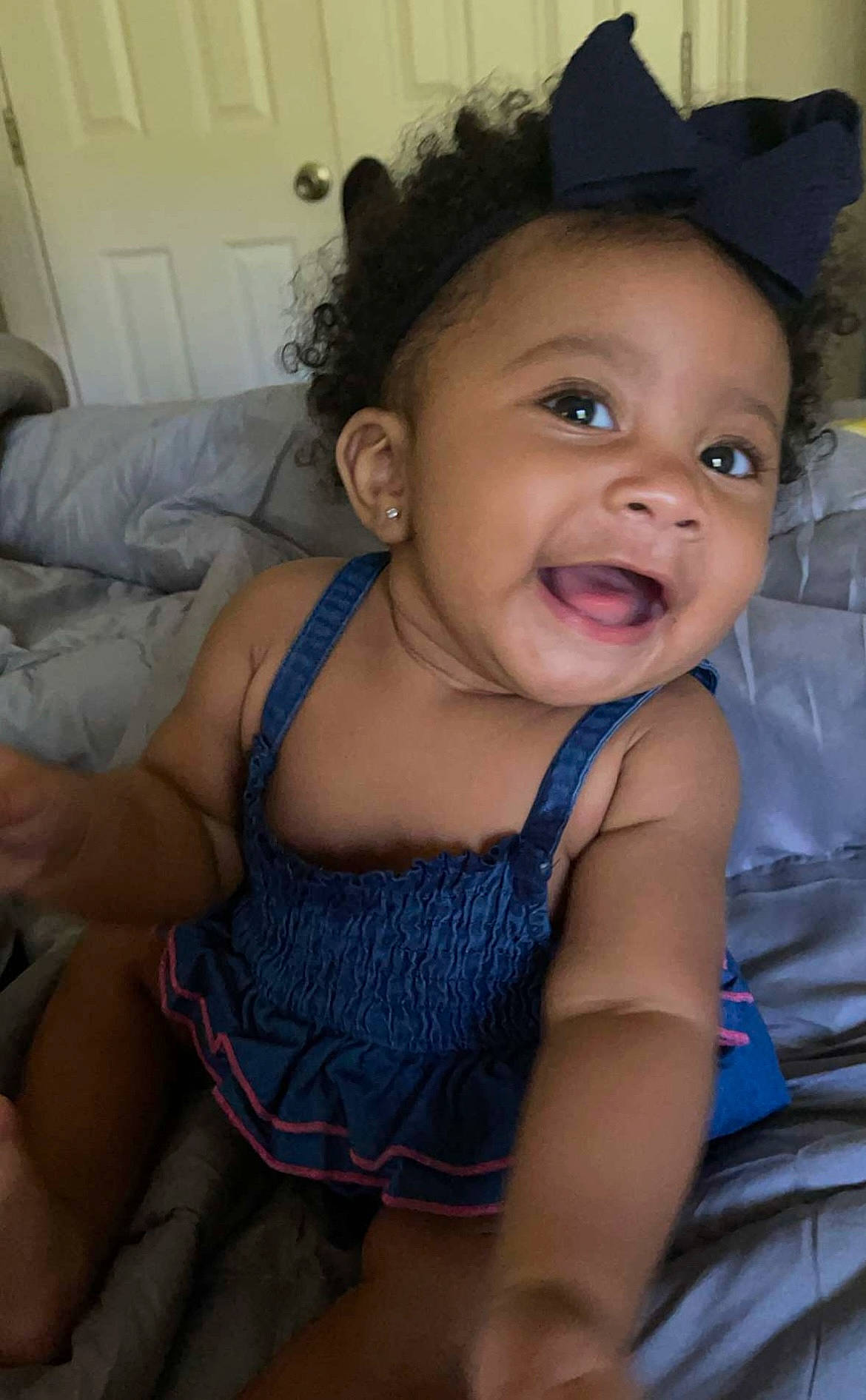 Braylee is registered to the contest to win money with this photo: baby_toddler_clothing, cheek, chin, comfort, eye, eyebrow, face, hair, hat, head, human, human_body, iris, lip, mouth, muscle, neck, person, skin, smile