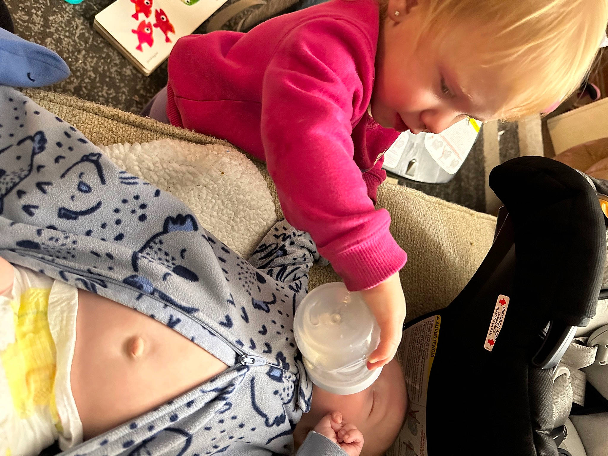 Dean joined the competition — help win amazing prizes! abdomen, baby, baby_products, car_seat, child, comfort, drinkware, fashion_accessory, finger, fun, human_leg, knee, lap, linens, nail, pattern, person, sitting, sleeve, thigh