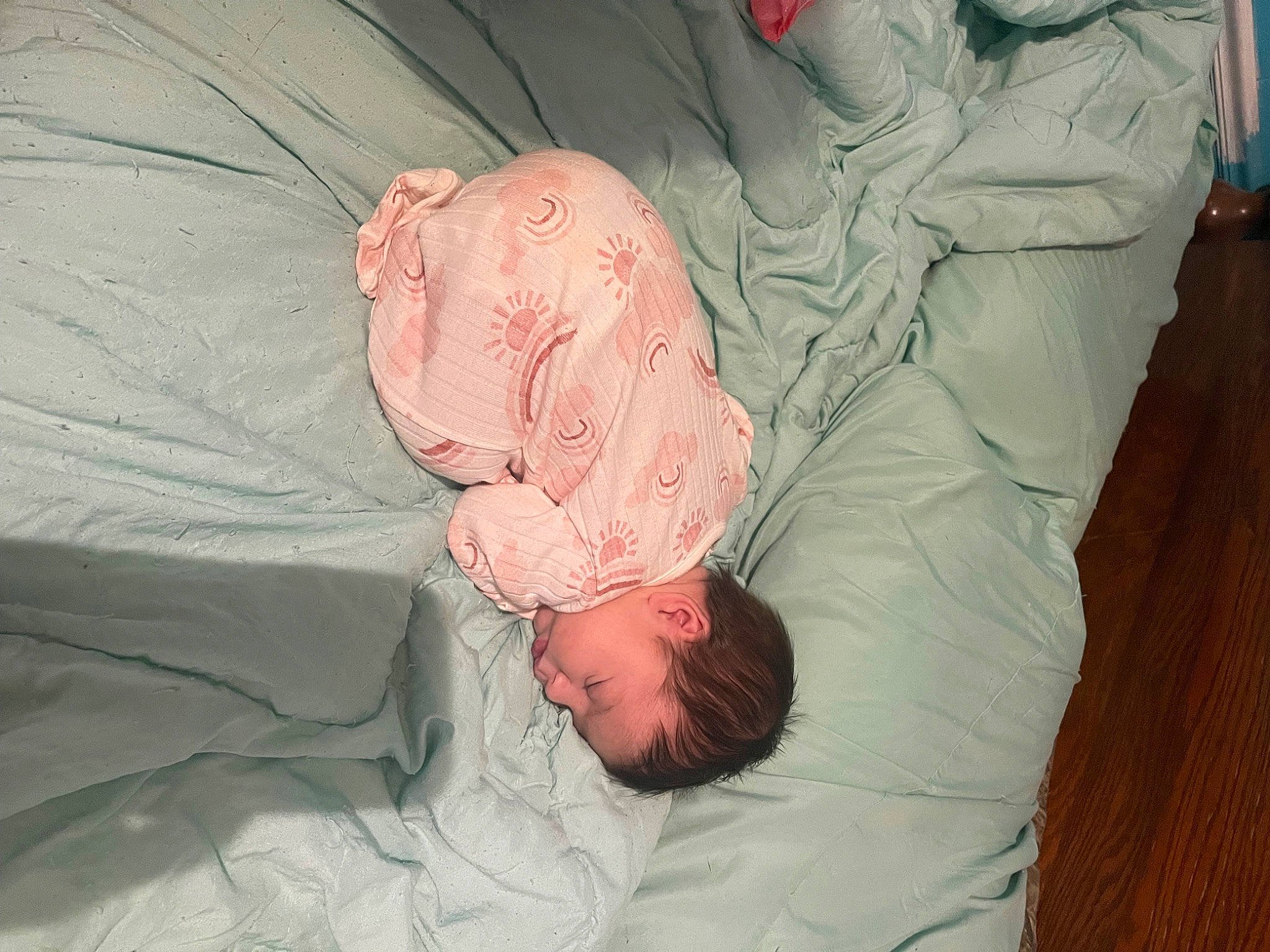 Grace-lynn is registered to the contest to win money with this photo: abdomen, arm, baby, baby_sleeping, bed, bedding, bedtime, child, comfort, event, eye, flesh, hand, human_body, knee, leg, linens, nap, person, room
