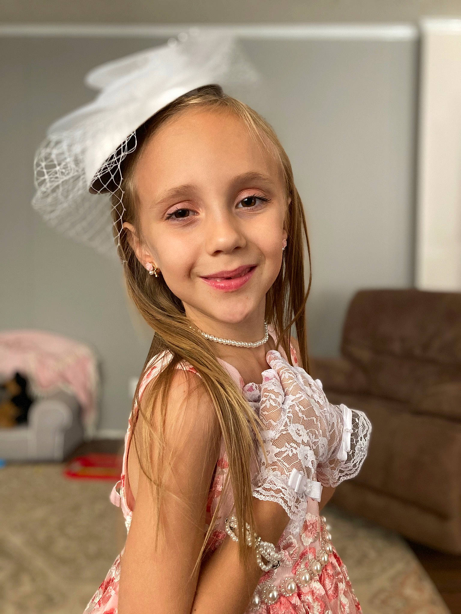 Brinlee is registered to the contest to win money with this photo: beauty, child, couch, dress, eyebrow, eyelash, facial_expression, fashion, fashion_design, flash_photography, fun, hairstyle, happy, head, human, joy, lip, organ, person, skin