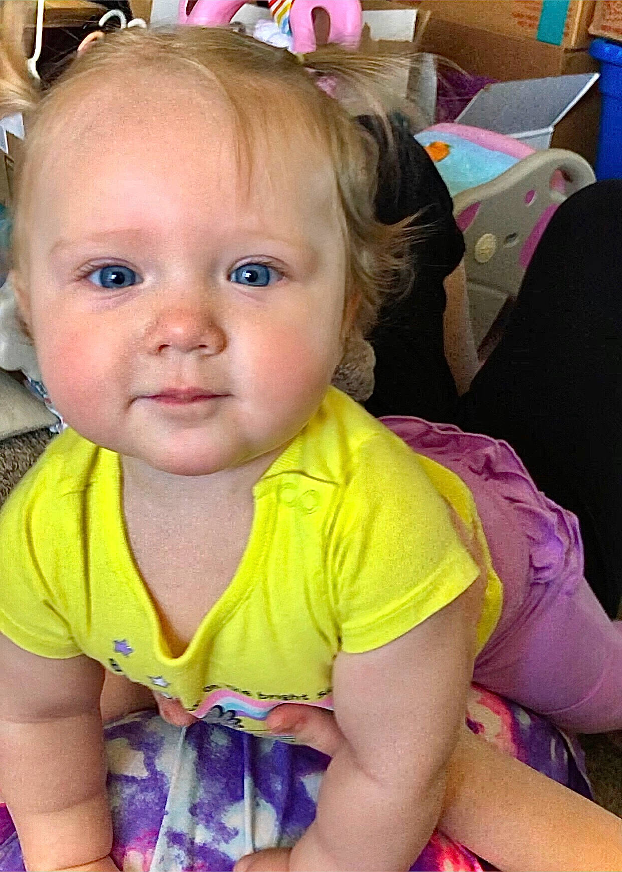 Karlie is registered to the contest to win money with this photo: baby_toddler_clothing, cheek, chin, cool, eye, eyebrow, eyelash, facial_expression, happy, head, iris, mammal, mouth, nose, organ, person, pink, purple, skin, smile