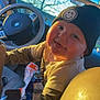 Grayson joined the competition — help win amazing prizes! baby, child, car_interior, steering_wheel, beanie, smile, sunlight, face, clothing, seat, window, trees, phone, snacks, childhood, happy, portrait, casual, indoors, warm_light