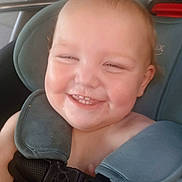 Grayson is registered to the contest to win money with this photo: baby, child, car_seat, smiling, happy, infant, seatbelt, safety, cute, face, portrait, car_interior, child_safety, baby_teeth, seat, straps, head_support, closeup, skin, transportation