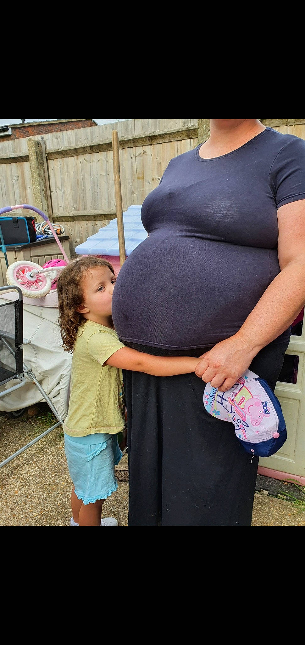 Skyla joined the competition — help win amazing prizes! bag, black, child, fun, gesture, joint, leg, leisure, luggage_and_bags, person, pink, shorts, shoulder, sleeve, standing, street_fashion, style, t_shirt, toddler, trunk