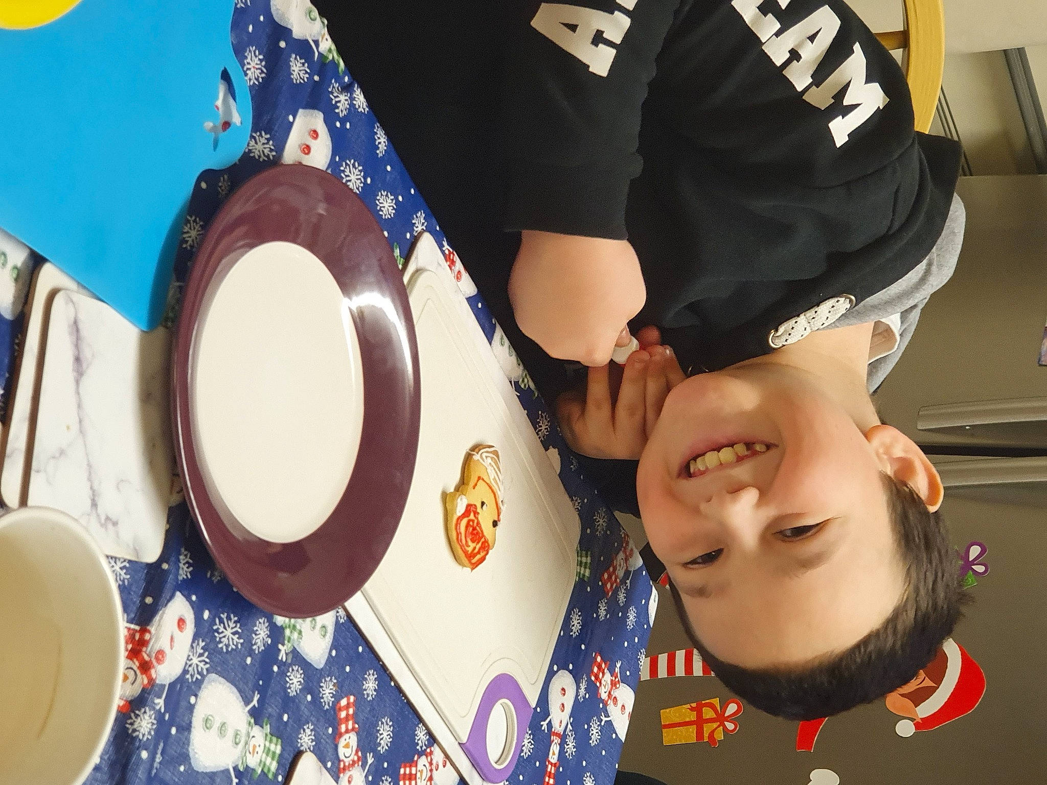 Toby is registered to the contest to win money with this photo: cap, circle, dishware, drum, event, fun, gesture, happy, hat, headgear, idiophone, joy, membranophone, musical_instrument, person, porcelain, serveware, shirt, sleeve, t_shirt