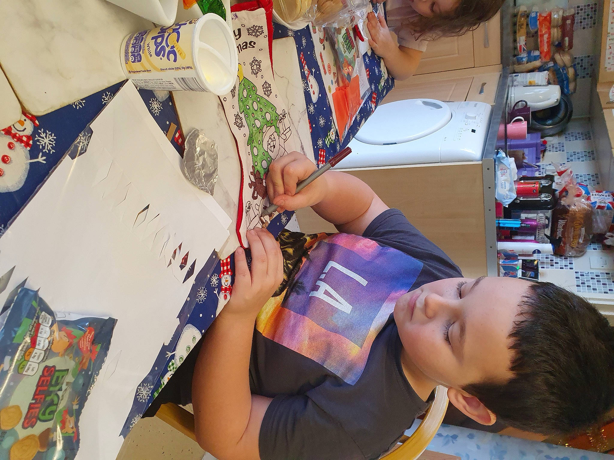 Toby is registered to the contest to win money with this photo: art, artist, automotive_design, beauty, child, creative_arts, drawing, finger, fun, illustration, leisure, paint, painting, person, product, publication, room, snapshot, t_shirt, toddler