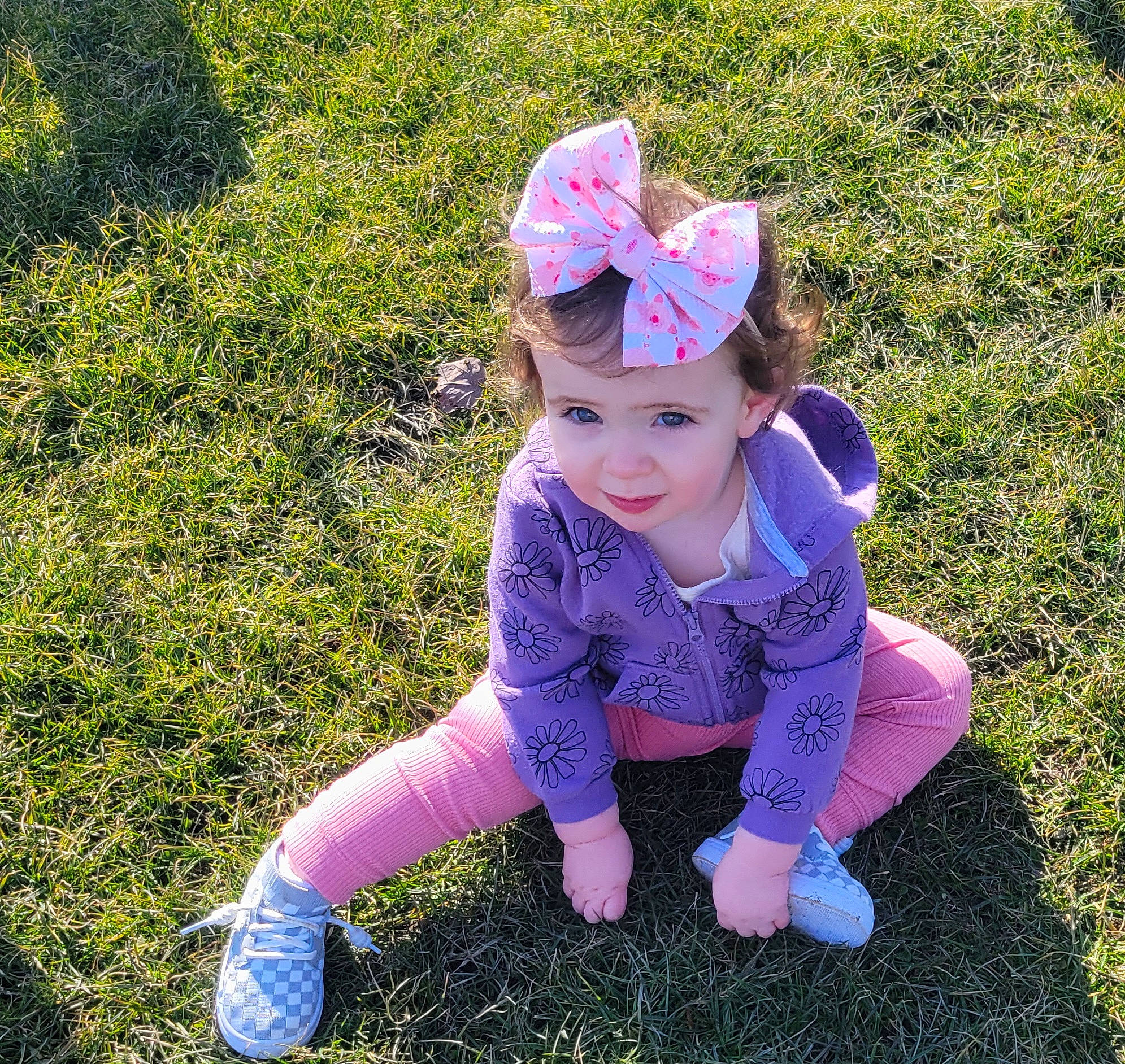 Mackenzie joined the competition — help win amazing prizes! baby_toddler_clothing, cap, costume_hat, electric_blue, fun, grass, grass_family, grassland, happy, hat, headwear, leaf, magenta, people_in_nature, person, petal, pink, purple, sleeve, smile