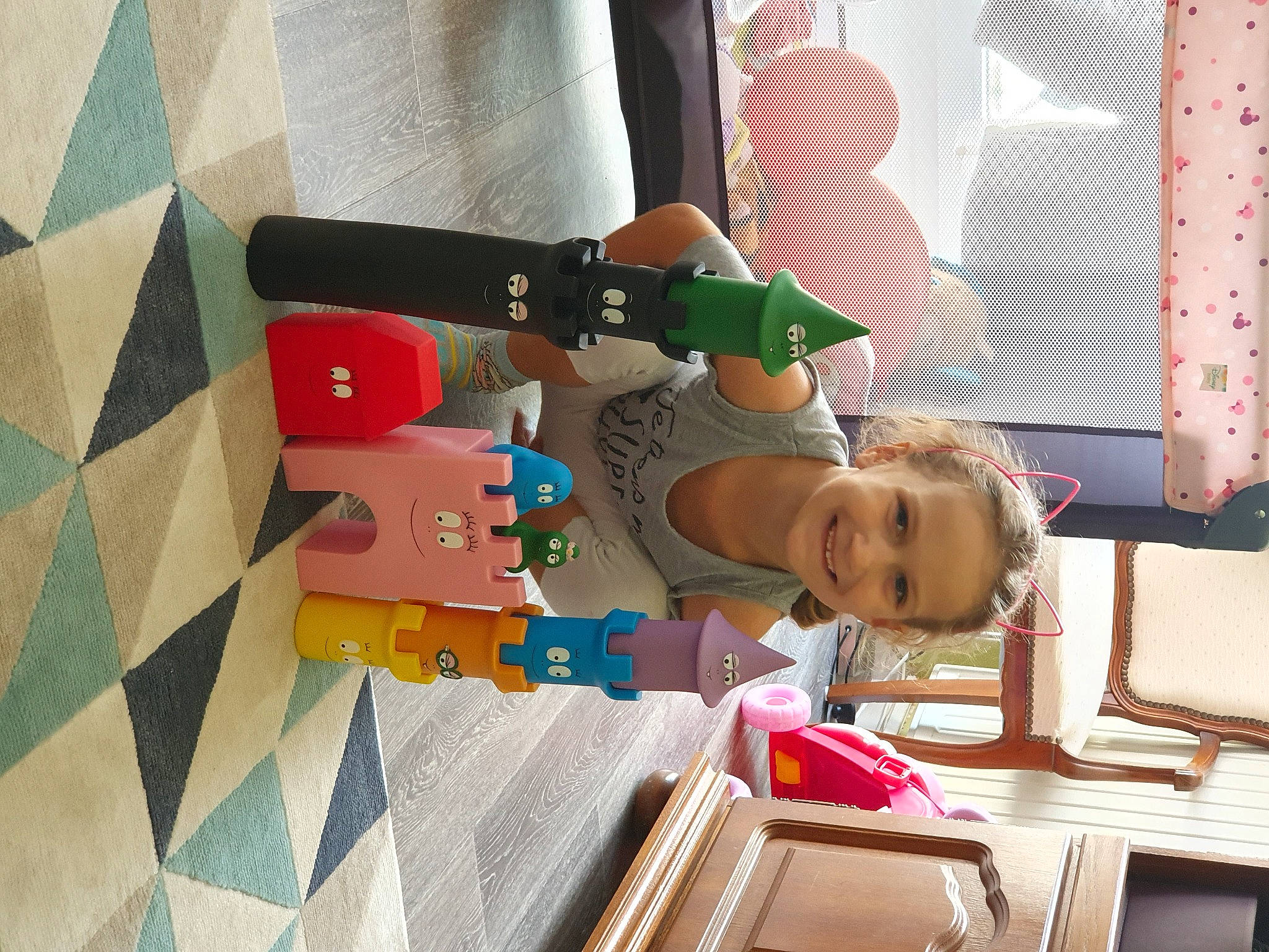 Apolline participe au concours pour gagner de l'argent avec cette photo : child, flooring, interior_design, joy, person, play, room, toddler, toy, wallpaper