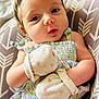 Elodie is registered to the contest to win money with this photo: baby, infant, mittens, headband, flower, dress, pillow, pattern, closeup, cute, child, adorable, portrait, skin, face, hands, young, sleepwear, resting, indoor