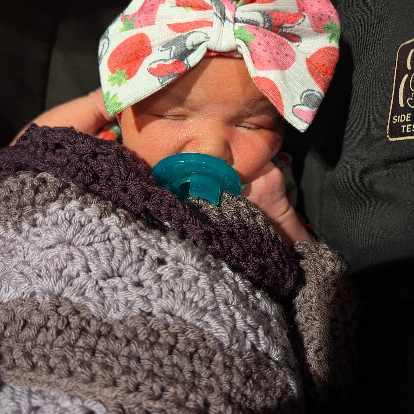 Electra Rayne joined the competition — help win amazing prizes! baby, blanket, bow, child, closeup, cozy, cute, face, hand, headband, indoors, infant, knitted, newborn, pacifier, portrait, resting, sleeping, soft_light, strawberry_pattern