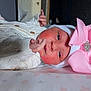 Willow joined the competition — help win amazing prizes! newborn, baby, infant, pink_bow, white_hat, knitted_outfit, rosy_cheeks, lying_down, blanket, star_pattern, cute, portrait, indoor, soft_lighting, hand, face, headwear, clothing, baby_girl, sleepy