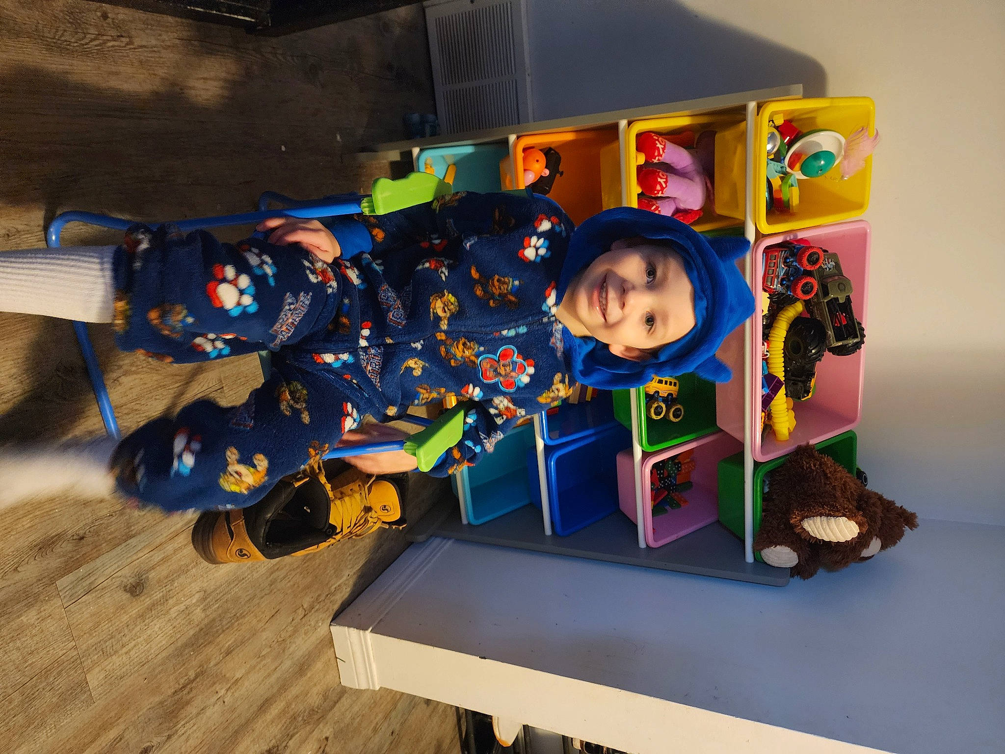 Seth Jacob Poole is registered to the contest to win money with this photo: baby_toys, event, flooring, fun, hardwood, headwear, joy, leisure, person, plastic, recreation, room, toddler, toy, visual_arts, wood