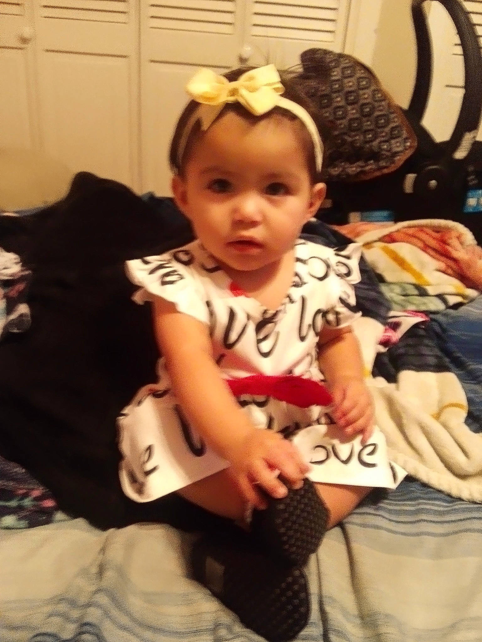 Deborah is registered to the contest to win money with this photo: baby, baby_toddler_clothing, cheek, child, comfort, costume_hat, door, event, eyewear, fashion_accessory, fun, happy, head, headband, headpiece, person, room, sitting, sleeve, t_shirt