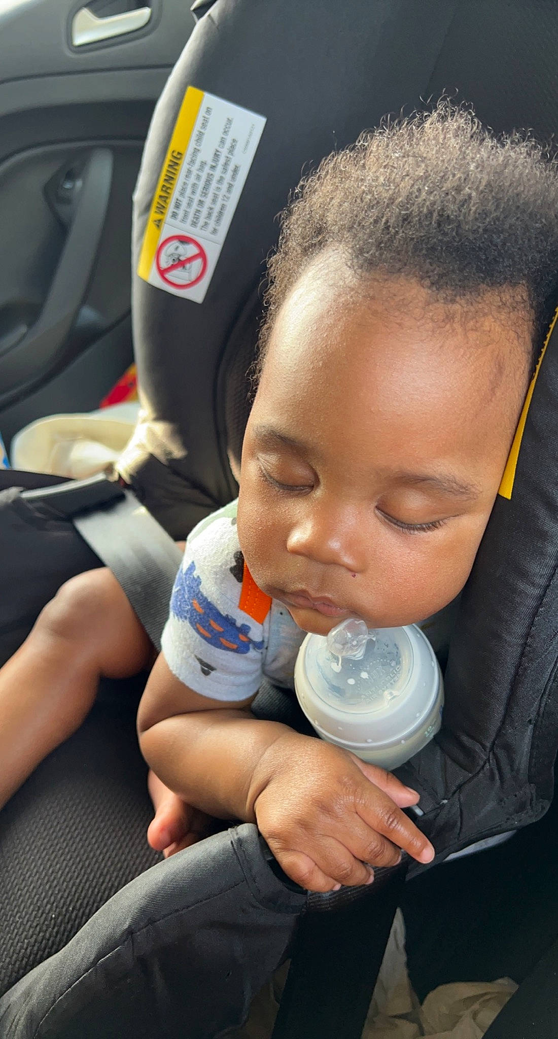 Hezekiah joined the competition — help win amazing prizes! auto_part, automotive_design, baby, baby_bottle, baby_toddler_clothing, car, car_seat, car_seat_cover, child, drinkware, eyelash, finger, nail, nose, person, plastic_bottle, product, skin, thumb, toddler