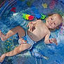 Kaloyan joined the competition — help win amazing prizes! baby, infant, pool, water, diaper, smile, happy, outdoor, sunlight, inflatable, plastic, child, blue, colorful, toy, play, summer, skin, face, legs