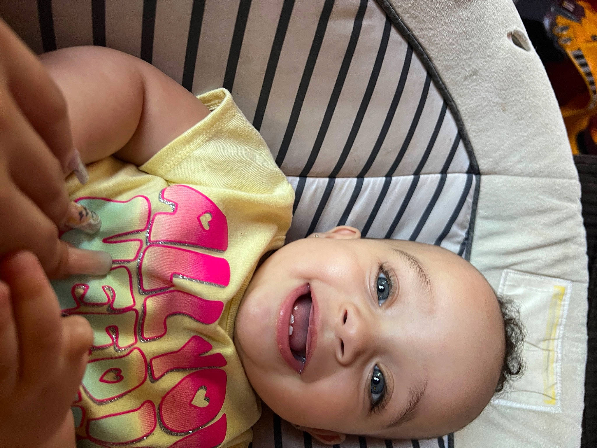 Remedy is registered to the contest to win money with this photo: baby, baby_toddler_clothing, cheek, child, comfort, eye, face, facial_expression, fun, happy, head, joy, lip, mouth, nail, nose, person, skin, smile, thumb