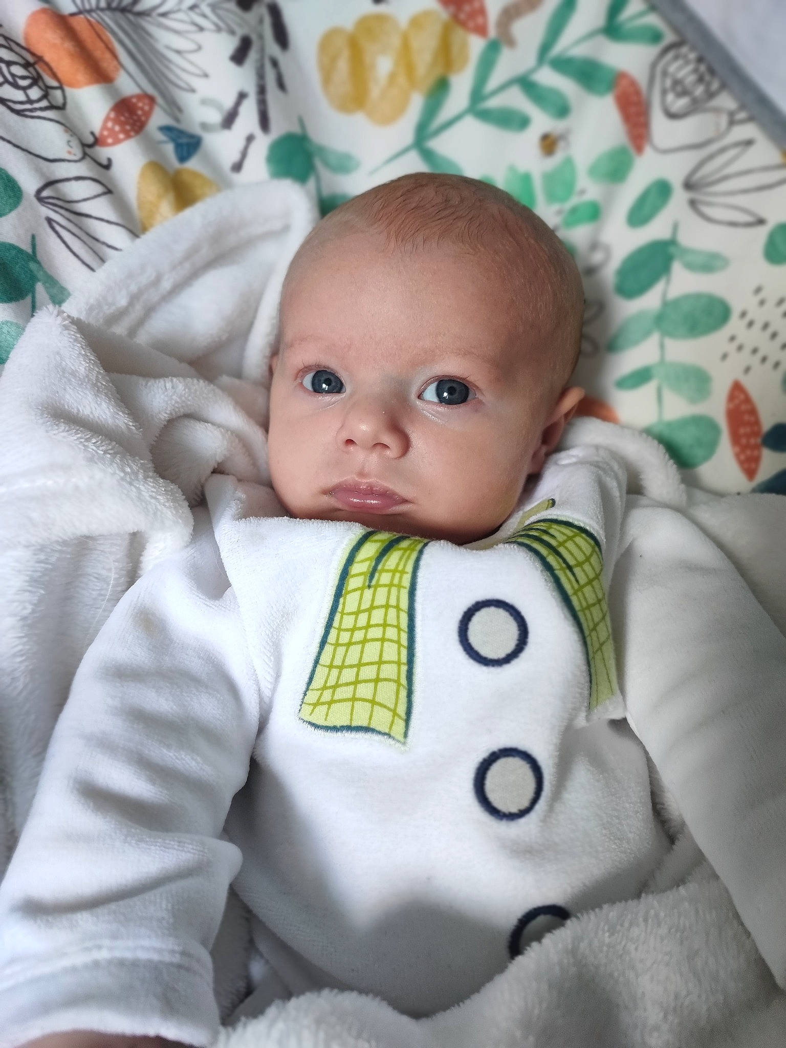 Fox is registered to the contest to win money with this photo: baby, baby_products, baby_toddler_clothing, baby_toys, carmine, cheek, child, comfort, happy, head, linens, nose, pattern, person, product, room, sitting, skin, sleeve, toddler