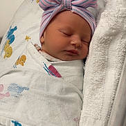 Ava joined the competition — help win amazing prizes! newborn, baby, sleeping, hospital, blanket, hat, bow, bassinet, towel, infant, wrapped, cute, peaceful, child, portrait, bed, cozy, soft, rest, healthcare