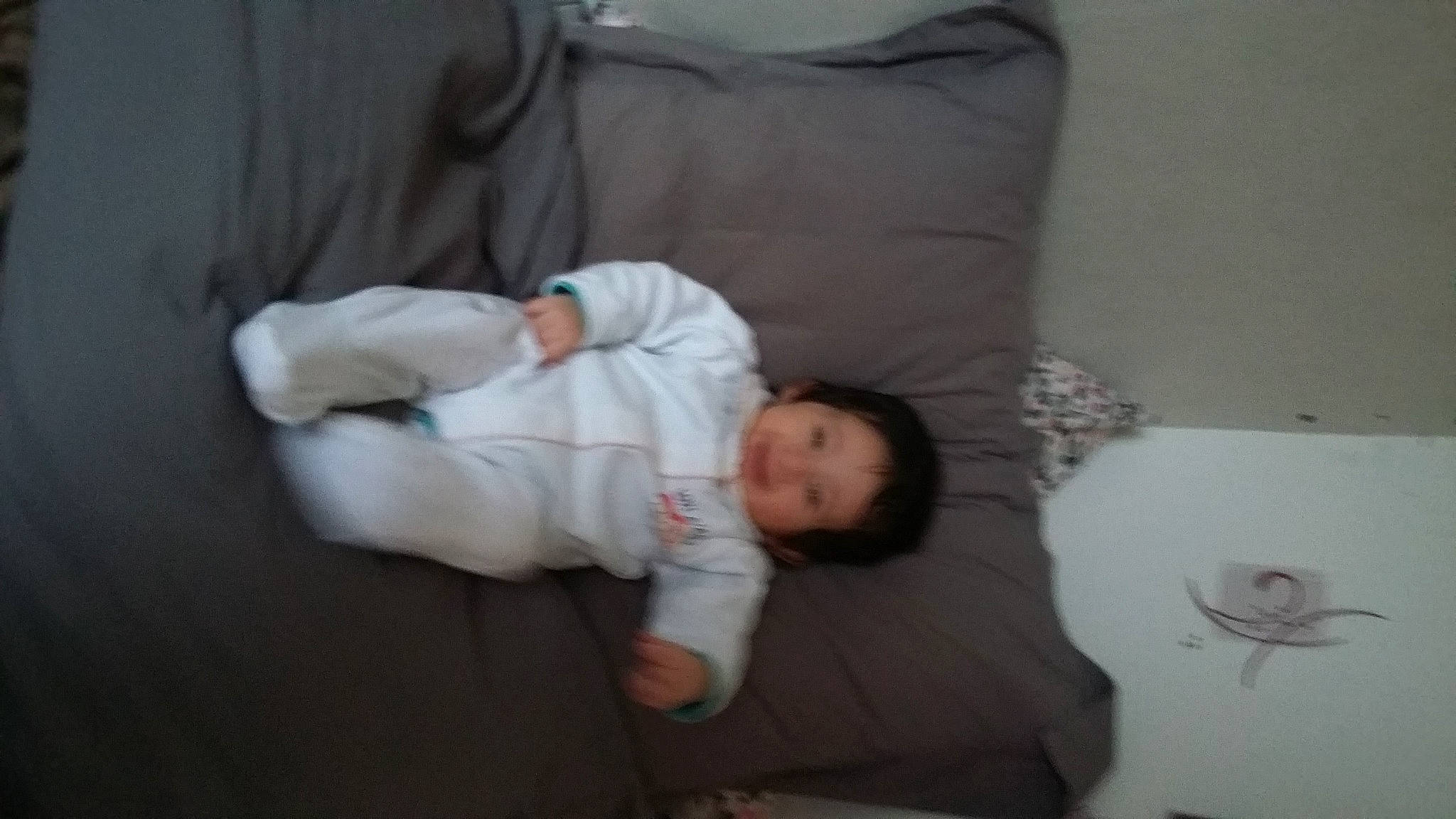 Sanà a rejoint le concours — aidez-le/la à gagner de superbes lots ! baby, baby_products, baby_sleeping, baby_toddler_clothing, bedding, bedtime, child, comfort, cup, flooring, linens, mug, nap, person, room, serveware, sitting, sleeve, tableware, toddler