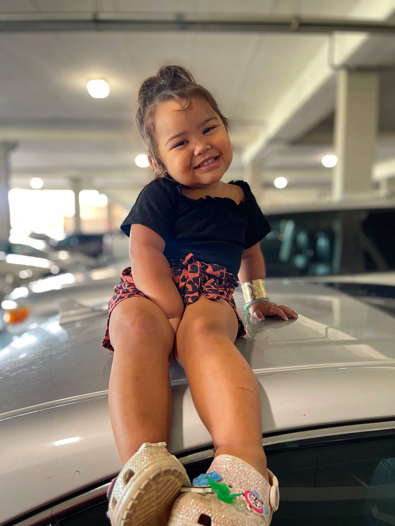 Milliyana Kurrencee is registered to the contest to win money with this photo: automotive_design, automotive_exterior, bumper, flash_photography, foot, fun, happy, hood, human_leg, joy, knee, leisure, person, personal_luxury_car, recreation, skin, smile, sportswear, thigh, toddler