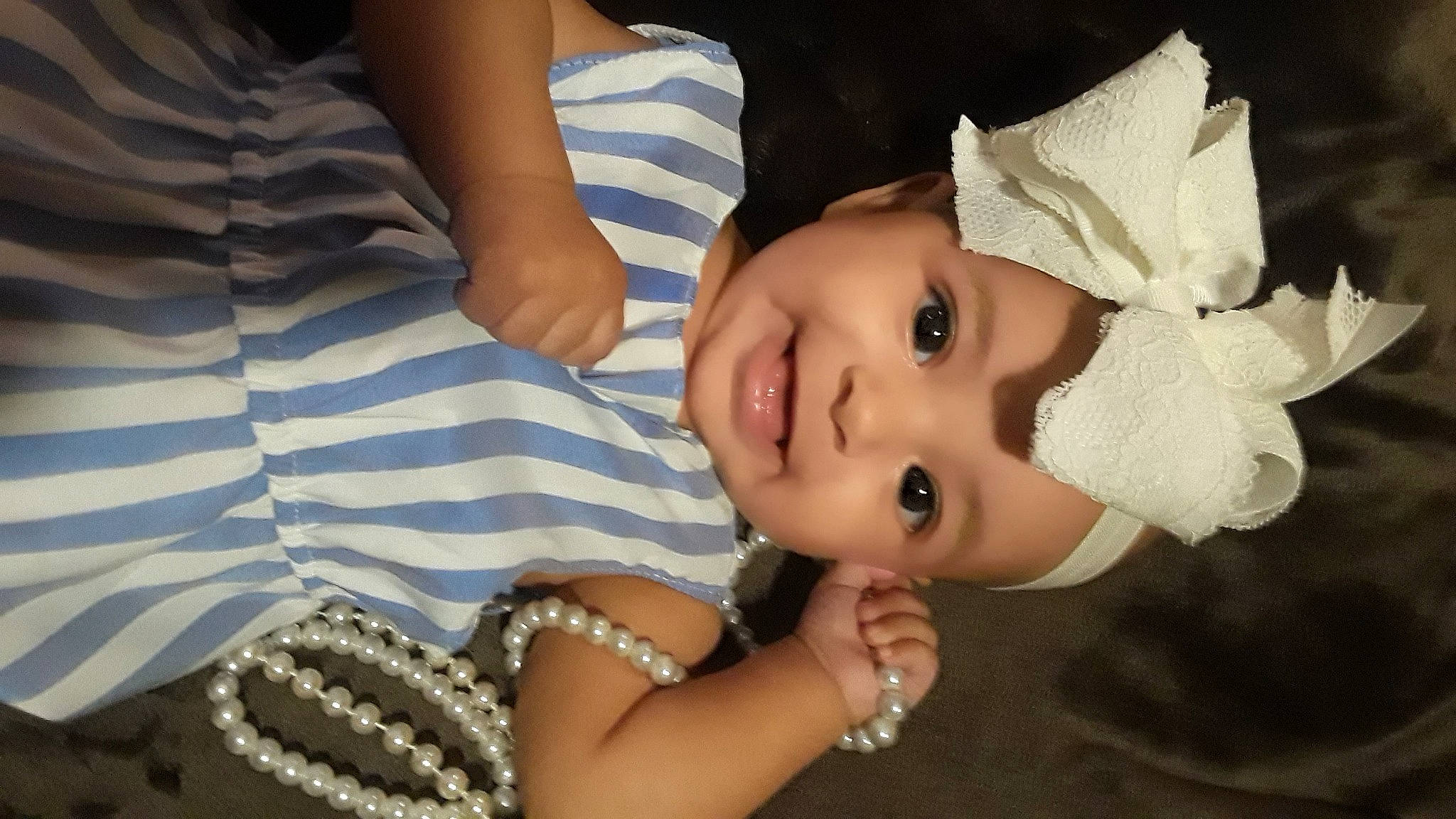 Alena is registered to the contest to win money with this photo: baby, cheek, child, ear, eye, eyelash, face, hair_accessory, head, headgear, headpiece, headwear, joy, lip, mouth, nose, person, skin, toddler