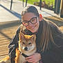 Axie participe au concours pour gagner de l'argent avec cette photo : girl, dog, shiba_inu, glasses, smile, outdoor, sunlight, wooden_deck, pet, happy, young_person, casual_clothing, nature, greenery, leisure, daylight, portrait, animal, friendship, candid