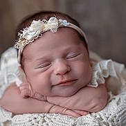 Amélie a rejoint le concours — aidez-le/la à gagner de superbes lots ! newborn, baby, sleeping, headband, smile, closeup, blanket, knitted, soft, peaceful, portrait, infant, cute, resting, hands, face, adorable, cozy, warm, babywear