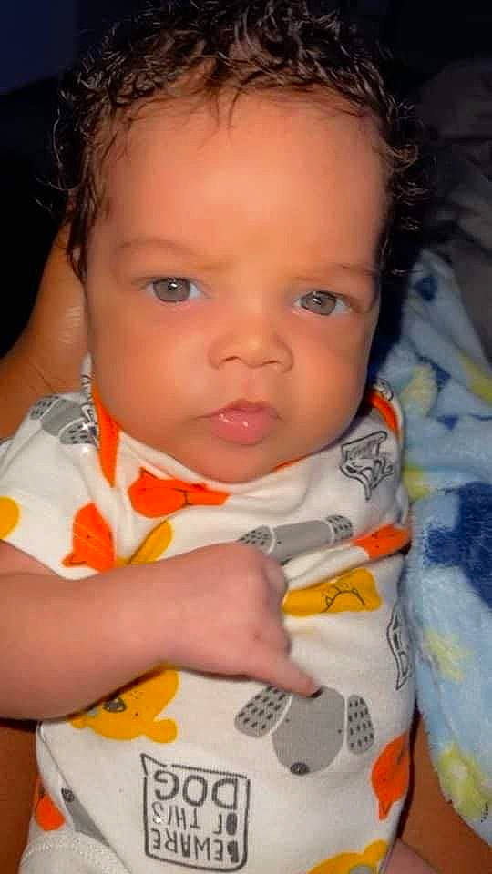 Karsyn is registered to the contest to win money with this photo: baby, baby_toddler_clothing, cheek, chin, ear, eyebrow, eyelash, forehead, hair, hairstyle, iris, lip, mouth, nose, orange, person, product, skin, sleeve, toddler