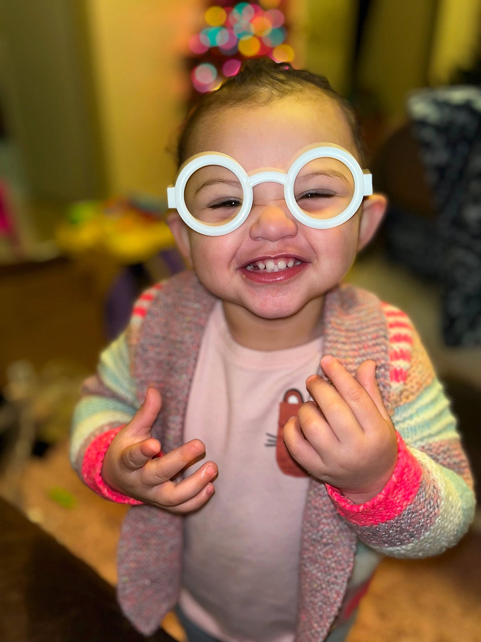 Henley joined the competition — help win amazing prizes! cheek, child, cool, costume, event, eyewear, fashion_accessory, fun, gesture, glasses, happy, head, headpiece, nose, party_supply, person, pink, skin, smile, thumb