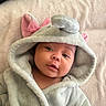 Aurora is registered to the contest to win money with this photo: baby, child, hood, elephant_costume, towel, blanket, cute, face, portrait, soft, cozy, pink_bow, ears, infant, smile, warm, sleepwear, indoors, closeup, adorable