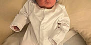 Terry is registered to the contest to win money with this photo: baby, newborn, infant, onesie, hat, pillow, pacifier, baby_wipes, bed, blanket, sleepwear, comfort, rest, cute, child, person, soft, nursery, indoor, sleep