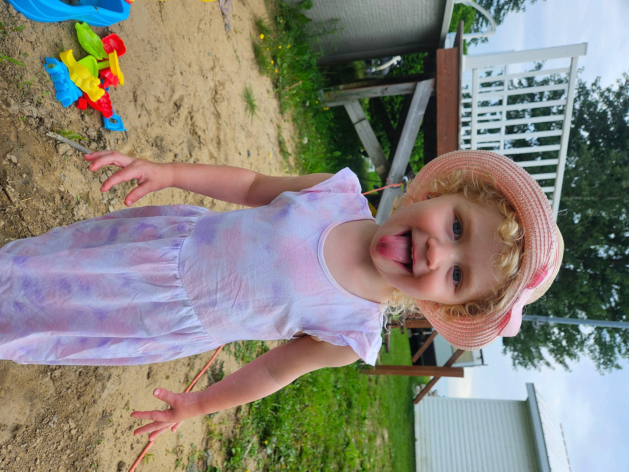 Celeste participe au concours pour gagner de l'argent avec cette photo : baby_toddler_clothing, child, fun, grass, green, happy, hat, headwear, leisure, people_in_nature, person, photograph, pink, plant, smile, summer, sun_hat, toddler, tree, vacation