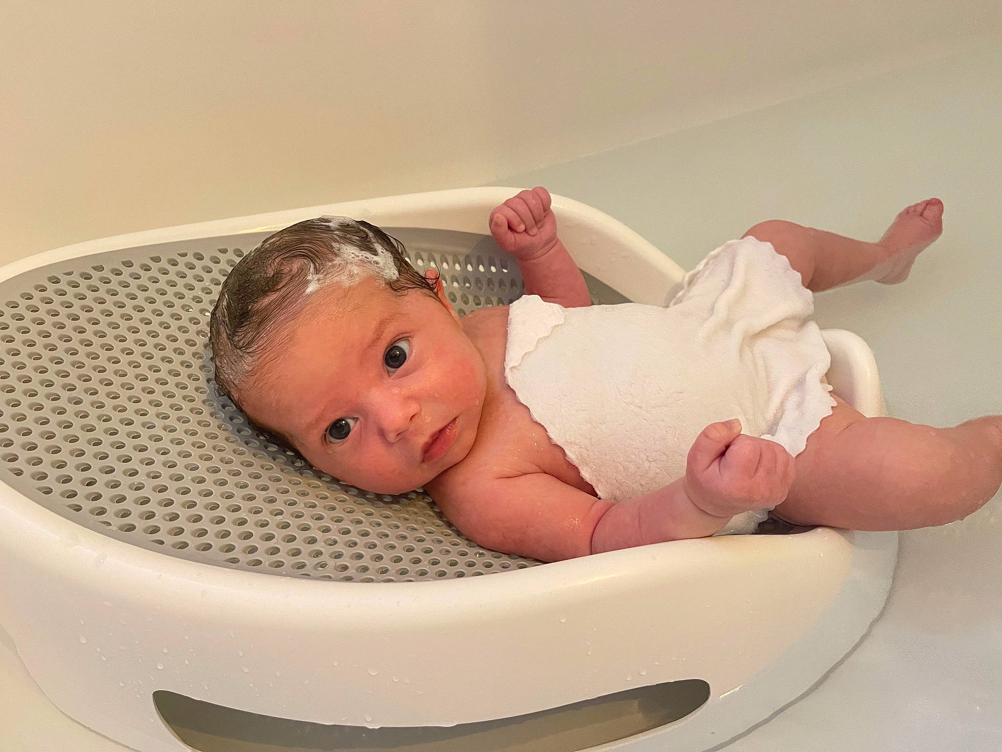 Josephine joined the competition — help win amazing prizes! baby, baby_bathing, baby_products, baby_safety, baby_sleeping, baby_toddler_clothing, bathing, child, comfort, fashion_accessory, flooring, foot, person, plumbing_fixture, room, sitting, skin, stomach, toddler
