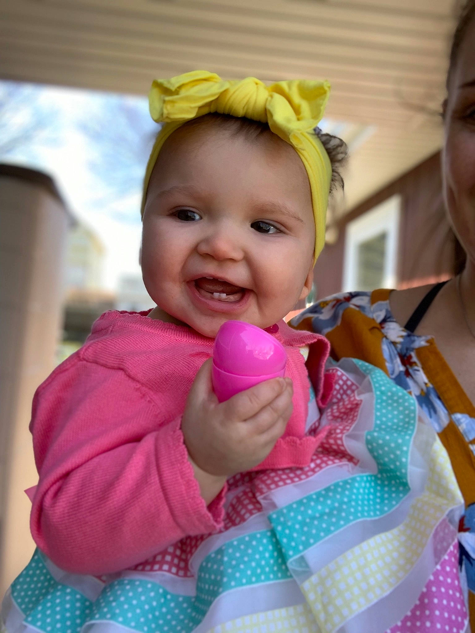 Elise is registered to the contest to win money with this photo: baby, baby_toddler_clothing, cheek, clothing, ear, eye, face, facial_expression, fun, gesture, hair, happy, head, iris, lip, mouth, person, pink, skin, smile