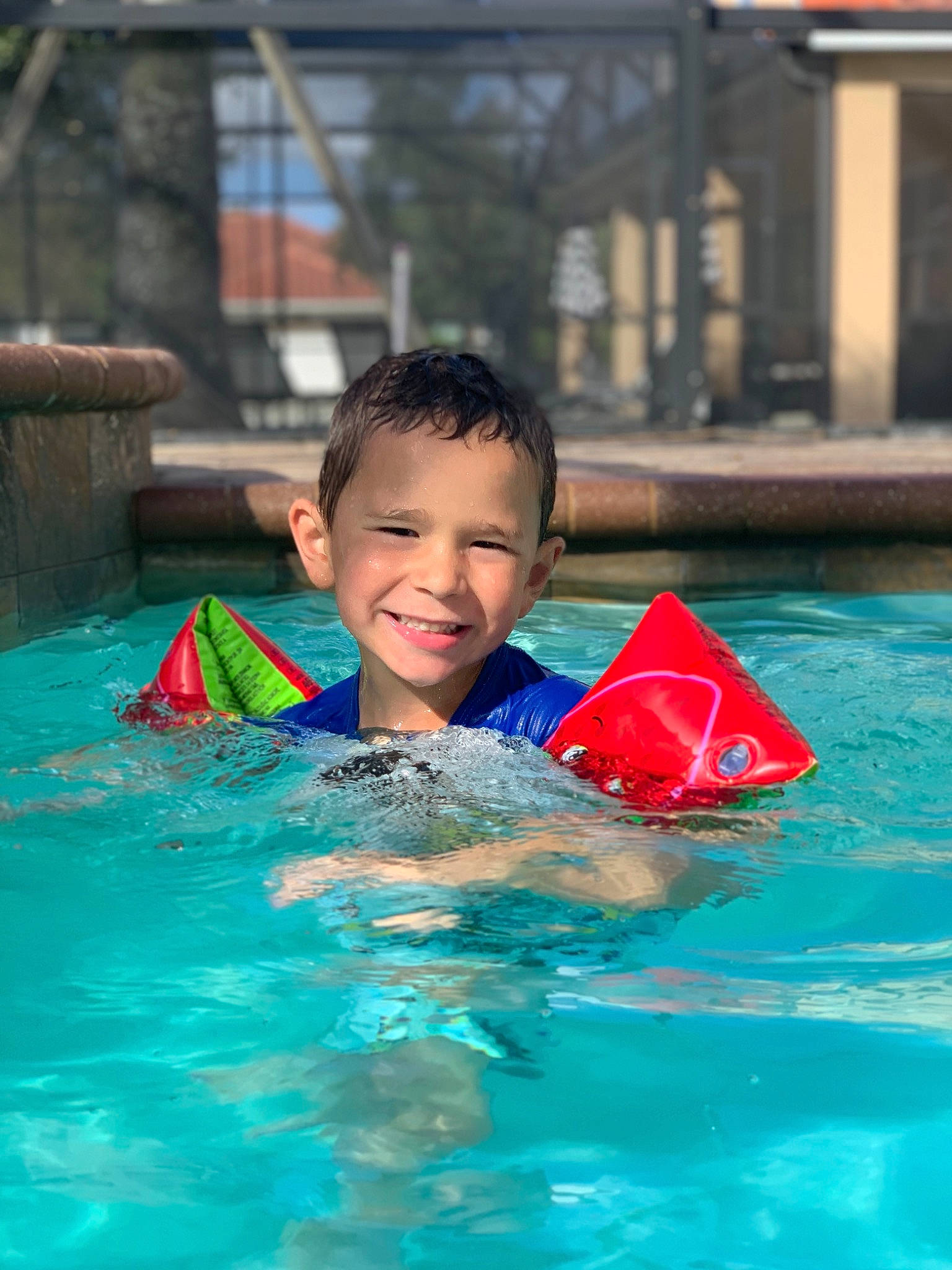 Carter Jon Ponte is registered to the contest to win money with this photo: azure, beauty, child, face, fun, games, happy, indoor_games_and_sports, joy, leisure, leisure_centre, outdoor_recreation, person, personal_protective_equipment, play, recreation, smile, sports, swimming_pool, toddler