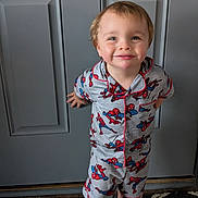 Christian joined the competition — help win amazing prizes! child, toddler, barefoot, pajamas, spiderman, smile, standing, indoors, rug, door, happy, cute, person, clothing, pattern, home, young, face, feet, playful