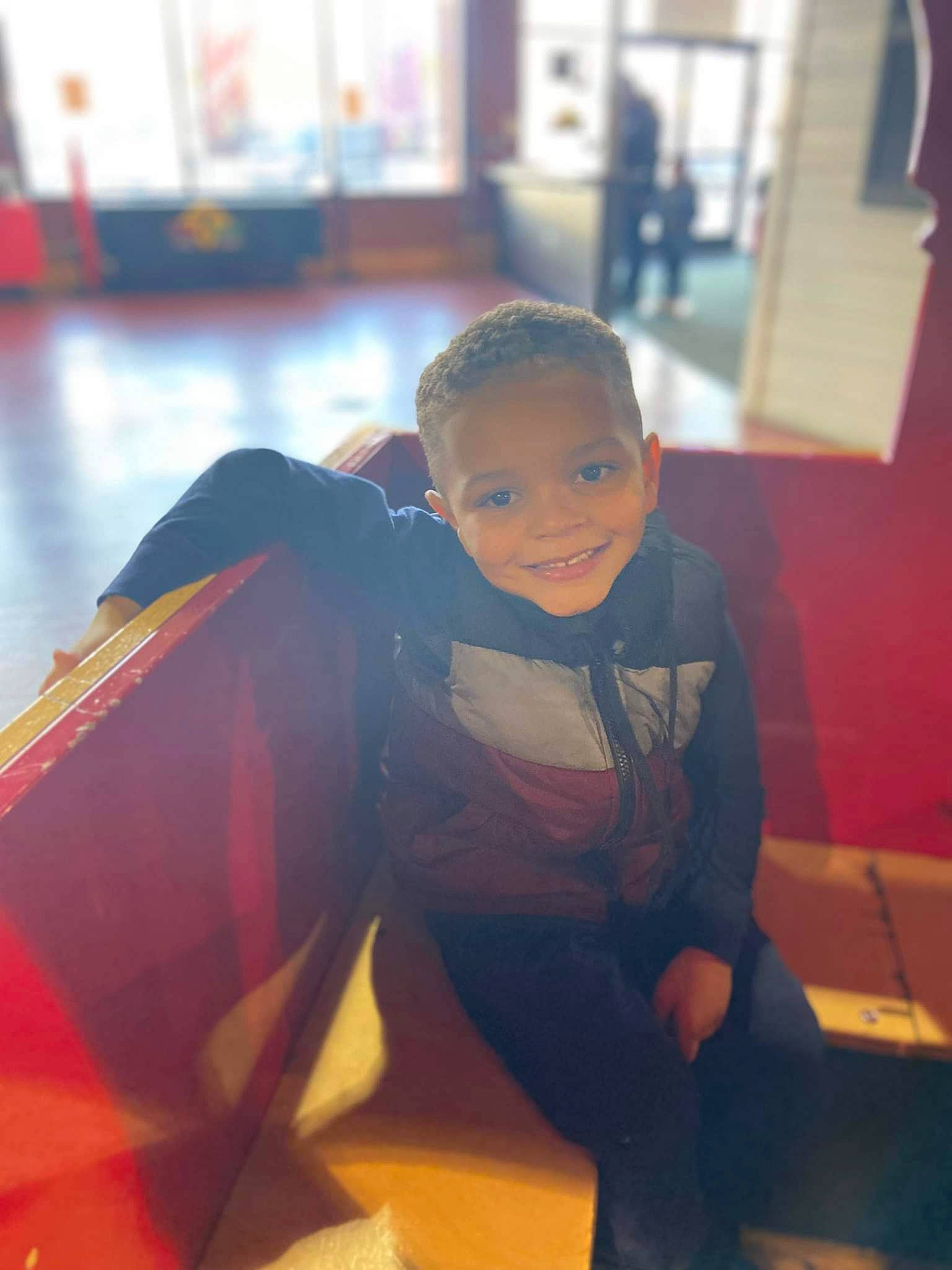 Major is registered to the contest to win money with this photo: beauty, chair, child, electric_blue, flooring, fun, happy, human, joy, leisure, people, person, play, room, sitting, smile, standing, tints_and_shades, toddler, vacation