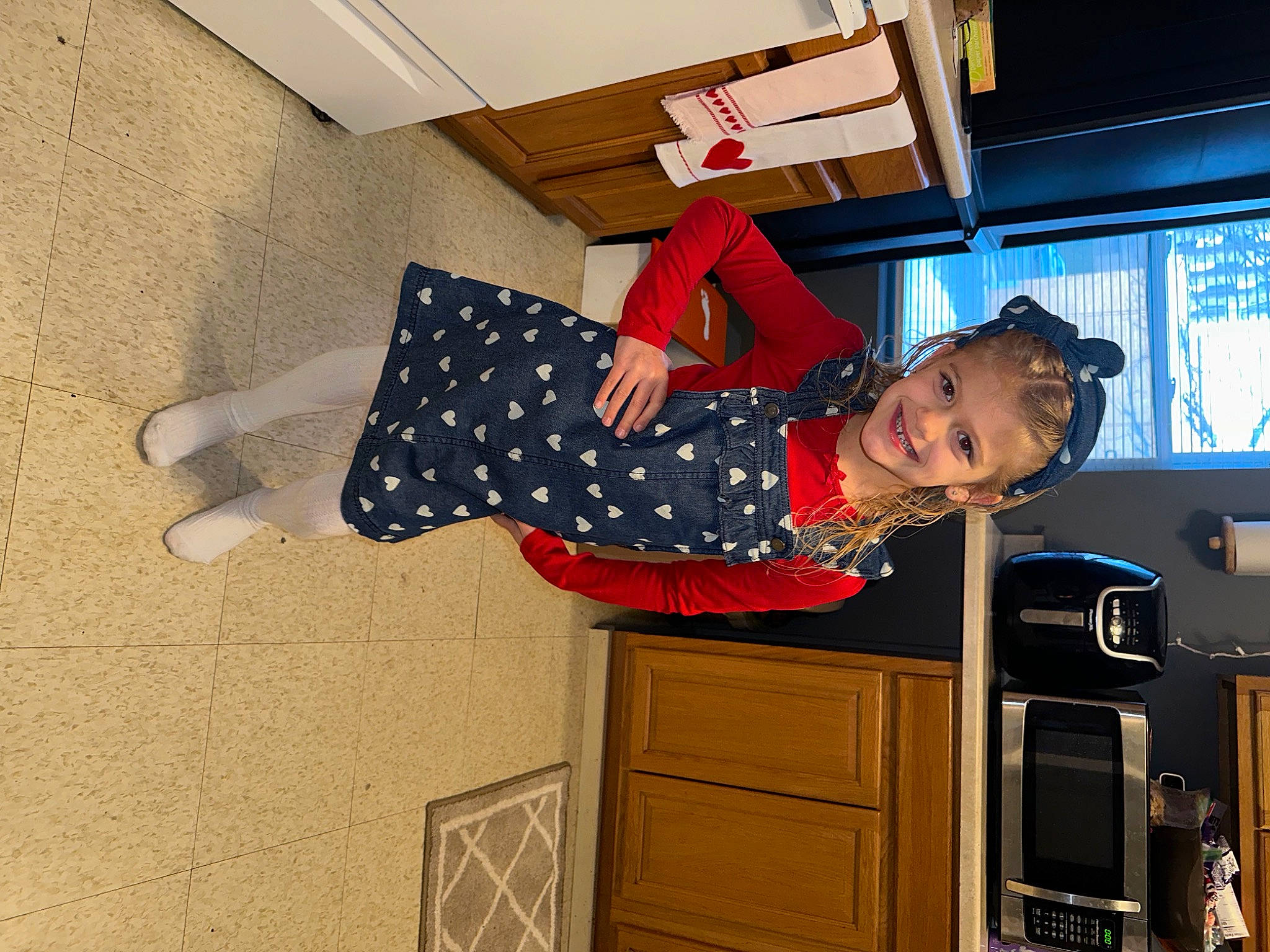 Raylyn joined the competition — help win amazing prizes! cabinetry, chest_of_drawers, countertop, cupboard, drawer, dress, electric_blue, flag_of_the_united_states, flooring, home_appliance, joy, kitchen, kitchen_appliance, microwave_oven, pattern, person, refrigerator, room, smile, tableware