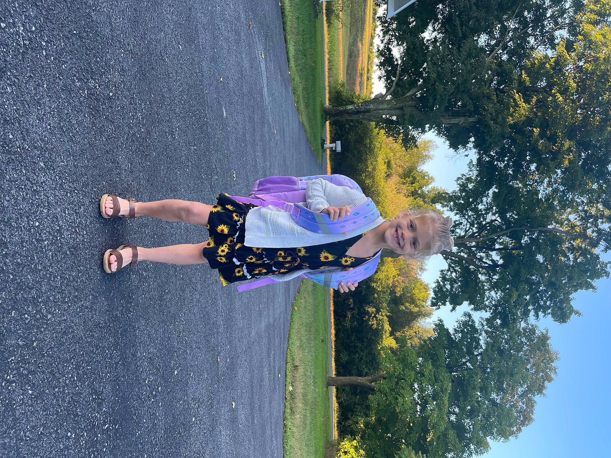 Raylyn is registered to the contest to win money with this photo: asphalt, fun, grass, happy, joy, leisure, people_in_nature, person, plant, recreation, sky, toddler, tree