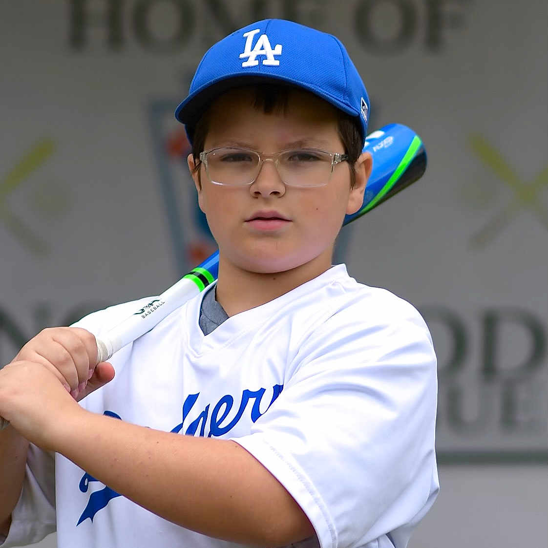 Brayden is registered to the contest to win money with this photo: accessories, athlete, ballplayer, baseball, baseballcap, baseballglove, bodypart, boy, cap, child, clothing, crowd, face, finger, glasses, glove, hand, hardhat, hat, head
