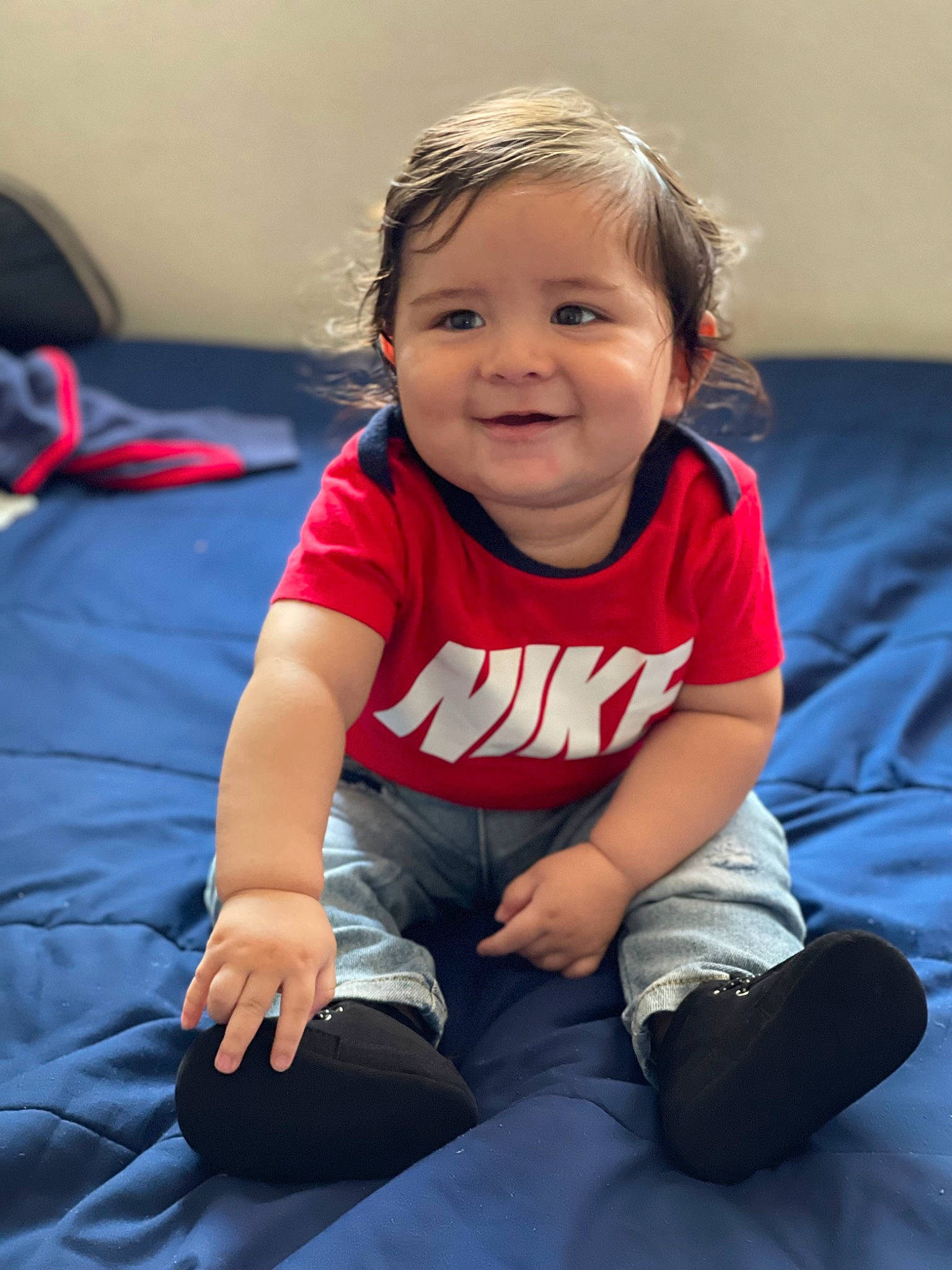 Braiden is registered to the contest to win money with this photo: arm, baby_toddler_clothing, cheek, child, comfort, electric_blue, eye, finger, flash_photography, fun, happy, head, joy, leisure, person, sitting, skin, sleeve, smile, standing