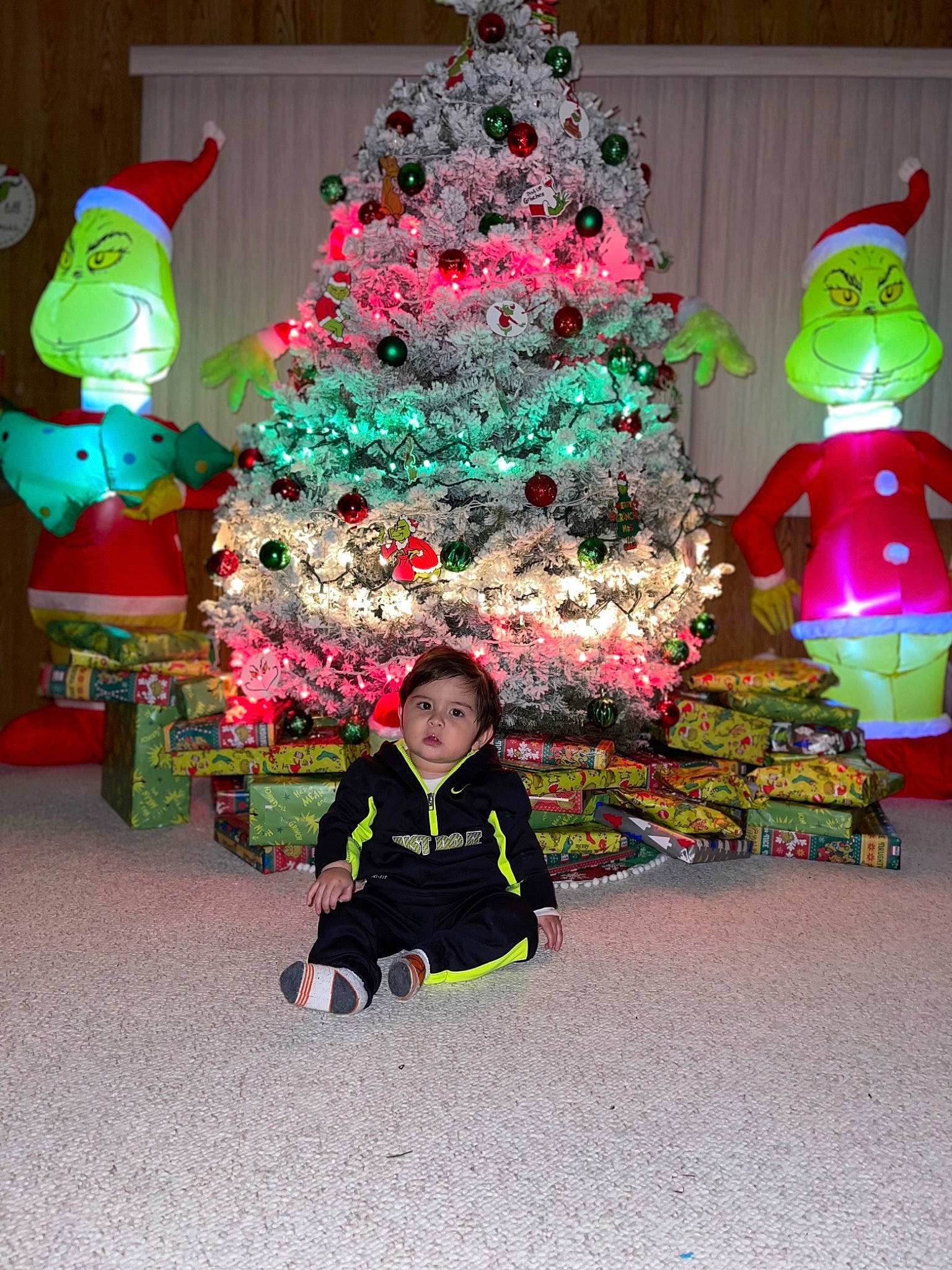 Braiden is registered to the contest to win money with this photo: christmas, christmas_decoration, christmas_eve, christmas_ornament, christmas_tree, cone, conifer, decoration, event, evergreen, green, holiday, holiday_ornament, interior_design, ornament, person, plant, room, tradition, tree