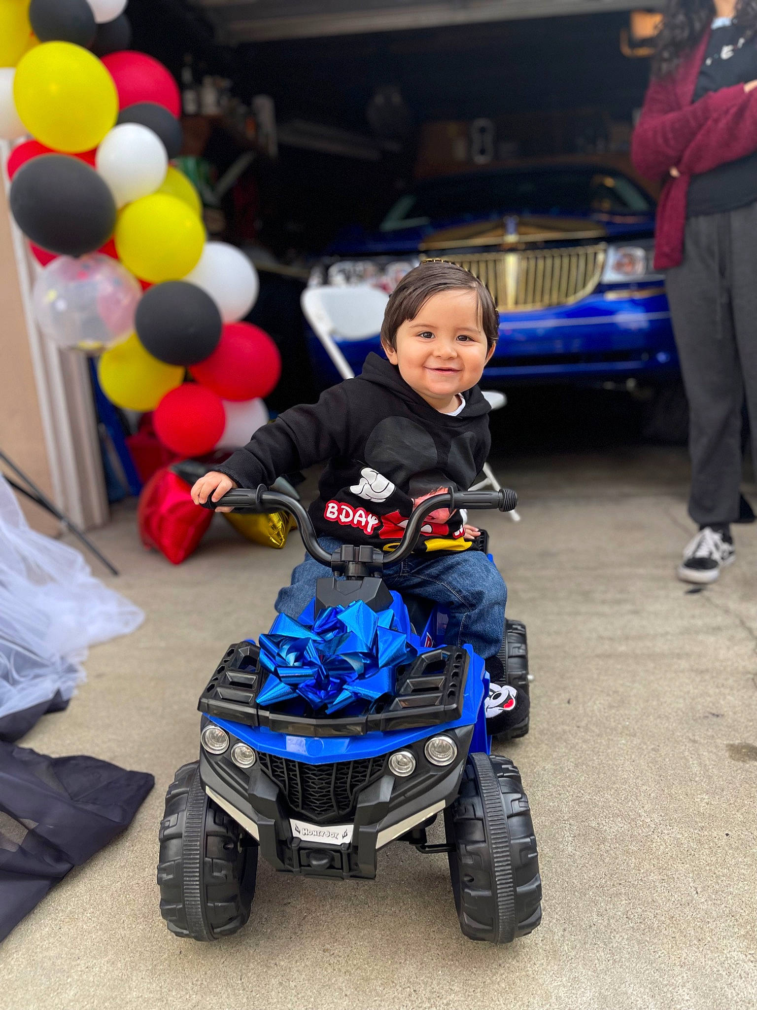 Braiden joined the competition — help win amazing prizes! all_terrain_vehicle, auto_part, automotive_design, automotive_exterior, automotive_tire, automotive_wheel_system, balloon, child, electric_blue, fun, joy, motor_vehicle, person, recreation, synthetic_rubber, t_shirt, tire, toddler, toy, tread