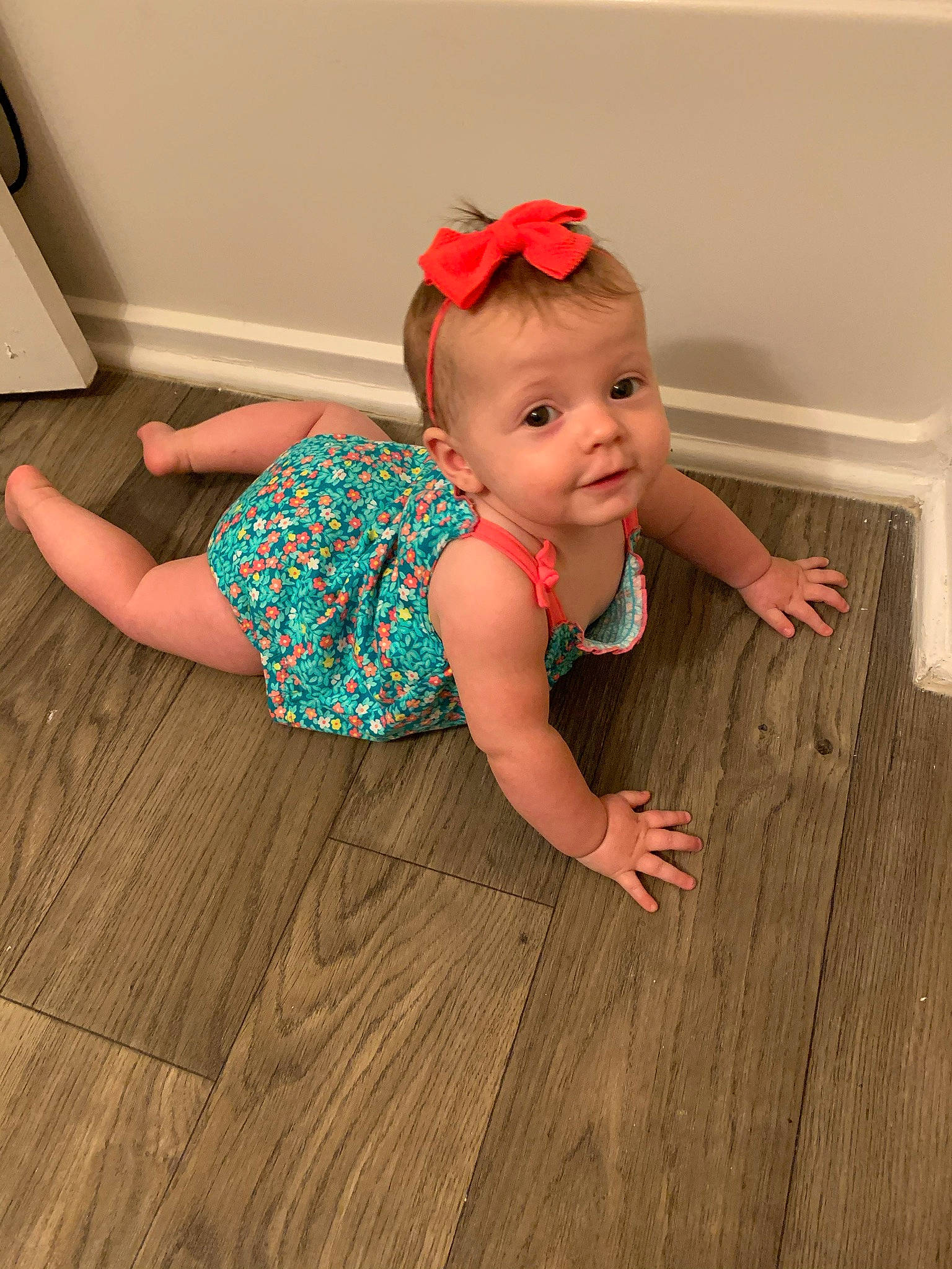 River is registered to the contest to win money with this photo: baby, baby_toddler_clothing, child, finger, floor, flooring, happy, hardwood, human_leg, laminate_flooring, pattern, person, skin, smile, thigh, toddler, trunk, varnish, waist, wood