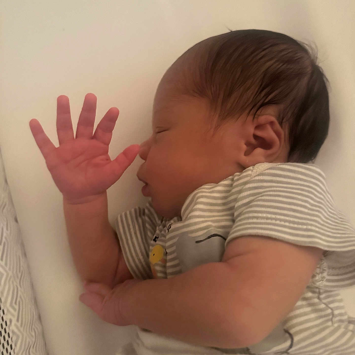 Iman is registered to the contest to win money with this photo: accessories, baby, bed, bedroom, bodypart, crib, face, finger, furniture, hand, head, indoors, infantbed, newborn, person, photography, portrait, room, sleeping, wrist